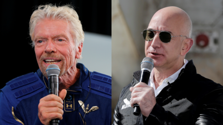 Richard Branson (L) and Jeff Bezos (R) © Reuters / Joe Skipper and Isaiah J. Downing