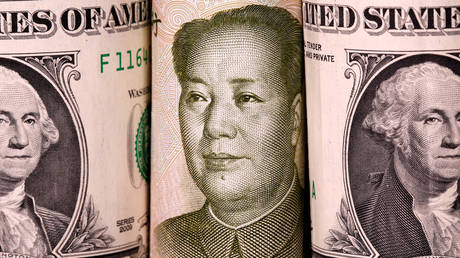 Chinese Yuan and US dollar banknotes.