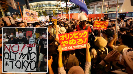 Protests were raised outside of the Tokyo Olympics 2020 opening ceremony © James Lang / USA Today Sports via Reuters | © Kirby Lee / USA Today Sports via Reuters