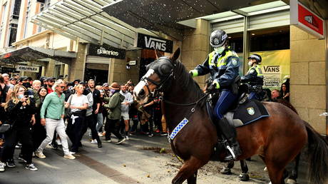 Anti-lockdown protesters clash with mounted police in Sydney, Australia, July 24, 2021