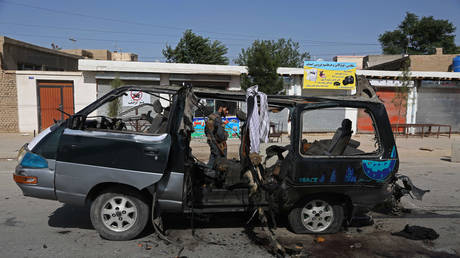 Afghan security forces at the site of an explosion in Kabul, Afghanistan, June 2021. © Zakeria Hashimi/Reuters
