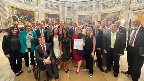 Republican members of the House of Representatives gather in the Capitol Rotunda to protest masking rules, July 29, 2021