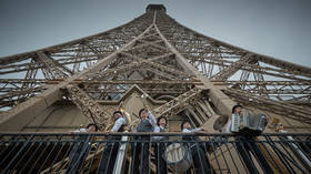 Paris’ iconic Eiffel Tower reopens after nine-month Covid hiatus, its longest closure since WWII