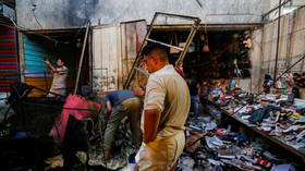 Roadside bombing at Baghdad market kills at least 25 people – reports