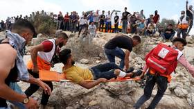 Over 140 Palestinians injured as Israeli forces use rubber bullets and tear gas to break up West Bank protest (PHOTOS, VIDEO)