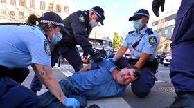 Disgruntled Australians scuffle with police at banned ‘Freedom' marches as Covid-19 lockdown extended in Sydney (PHOTOS, VIDEOS)