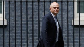 ‘I sincerely apologise’: UK health secretary deletes tweet telling Brits not to ‘cower’ from Covid-19 after sparking uproar