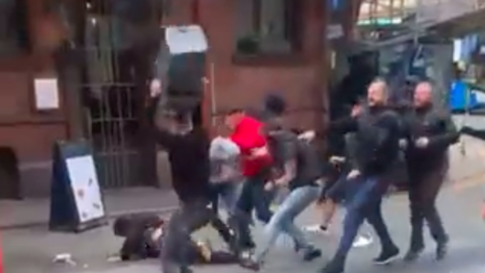 'Welcome back, football': Manchester United and Leeds fans clash on the streets ahead of Saturday's Premier League opener (VIDEO) — RT Sport News