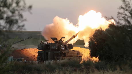 FILE PHOTO: Israeli artillery unit at work. © Reuters / Ammar Awad