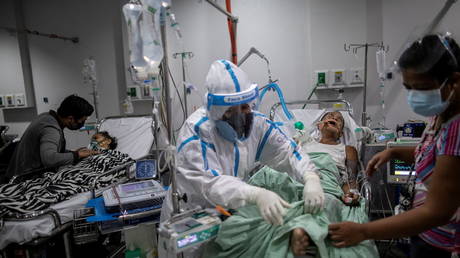 Hundreds of hospitals in Philippines are nearing full capacity, with Manila under new lockdown