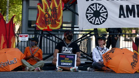 Environmental activists protest outside the White House in Washington, U.S.