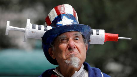 A person dressed as Uncle Sam protests vaccine mandate outside City Hall in Manhattan, New York City, August 9, 2021.