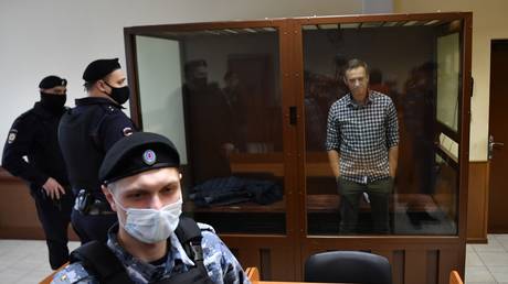 FILE PHOTO. Russian opposition activist Alexey Navalny waits in a courtroom during a hearing on appellation to cancel the decision to replace his suspended sentence in the Yves Rocher fraud case with a real jail term at Babushkinsky Court, in Moscow, Russia. © Sputnik