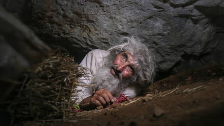 Panta Petrovic in his cave in the southern Serbian city of Pirot, on August 9, 2021 © AFP / OLIVER BUNIC