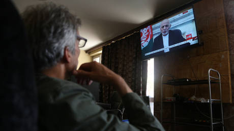 FILE PHOTO: Afghan president Mohammad Ashraf Ghani makes a televised address in Kabul, Afghanistan on August 14, 2021