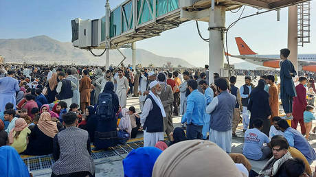 &lsquo;World has gone Covid-mad&rsquo;: Afghans fleeing Taliban need negative PCR test to board now-suspended commercial flights out of Kabul