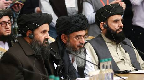 FILE PHOTO. Mullah Abdul Ghani Baradar, center, co-founder of the Taliban movement (terrorist organization, banned in Russia), attends an international peace conference for Afghanistan in Moscow, Russia. March 18, 2021