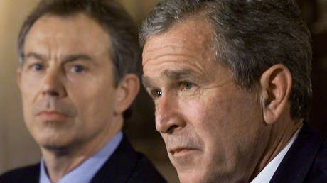 FILE PHOTO: Bush and Blair met in Washington to discuss the ongoing operations in Afghanistan, November 7, 2001.