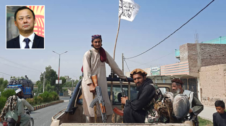 Taliban fighters drive an Afghan National Army (ANA) vehicle through the streets of Laghman province on August 15, 2021. © AFP; (inset) Ruslan Kazakbaev. © Sputnik