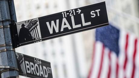 Road signs on Wall Street in New York, USA, February 6, 2018