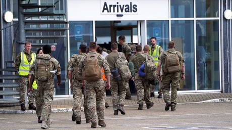 Members of the British armed forces arrive at RAF Brize Norton base after being evacuated from Kabul, in Oxfordshire, Britain on August 29, 2021.