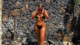 Footballer turned Instagram influencer Madelene Wright shows some skin in sizzling Santorini snaps (PHOTOS)