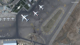 High-res satellite photos shows Kabul airport chaos as crowds of Afghans swarm runway in desperate effort to flee (PHOTOS)