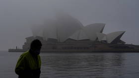 Australian PM vows to keep lockdowns until 70% of population is vaccinated as more protesters hit streets despite police crackdown