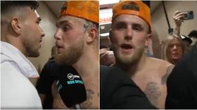 ‘Take the fight’: Jake Paul in backstage clash with Tommy Fury as brother of heavyweight boxing king demands showdown (VIDEO)