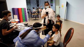 Israel reports record daily Covid cases over 10,900 for 1st time since pandemic outbreak as schools set to open