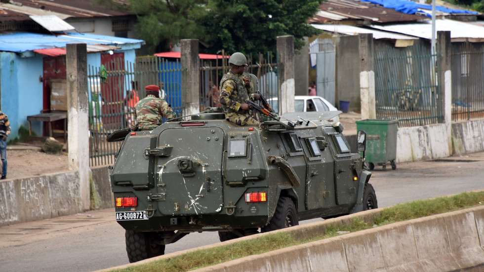 Heavy gunfire breaks out in Guinea’s capital, president reportedly DETAINED by military in apparent coup