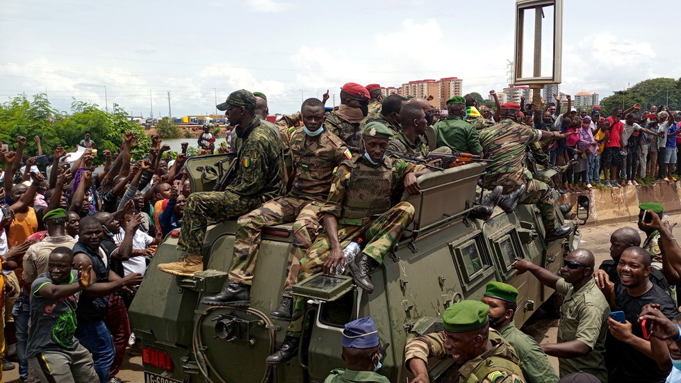Guinea’s coup leader pledges to create transitional government, respect business deals