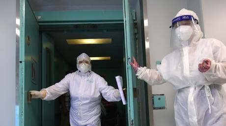 Stop politicizing the Covid-19 pandemic, Russia’s Putin & China’s Xi tell world, calling for cooperation to beat virus instead