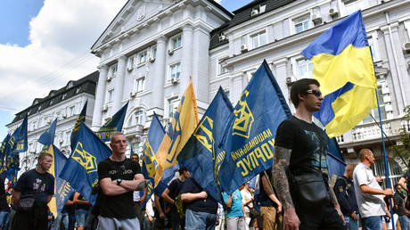 Activists of the National Corps and other patriotic organisations march along Volodymyrska Street, Kyiv, capital of Ukraine. © Olena Khudiakova/ Ukrinform/Barcroft Media via Getty Images