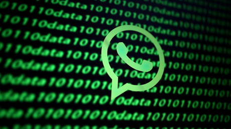 FILE PHOTO: The Whatsapp logo and binary cyber codes are seen in this illustration taken November 26, 2019 © Reuters / Dado Ruvic