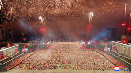 Fireworks explode over a paramilitary parade held to mark the 73rd founding anniversary of the North Korean republic, at Kim Il Sung square, in Pyongyang, North Korea, September 9, 2021.