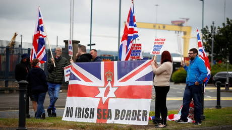 DUP threatens to withdraw from Northern Ireland power-sharing arrangement over EU-imposed trade barriers