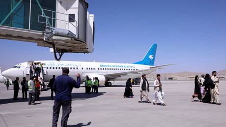 Around 200 foreigners, including Americans, fly out of Kabul in first large-scale departure since US ends troop withdrawal
