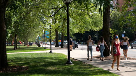 Students walk through the University of Michigan campus in Ann Arbor, Michigan