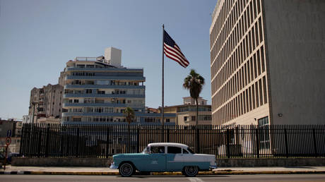 A car passes by the US Embassy in Havana, Cuba, March 2, © Reuters / Alexandre Meneghini