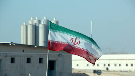 A picture taken on November 10, 2019, shows an Iranian flag in Iran's Bushehr nuclear power plant. © AFP / Atta Kenare