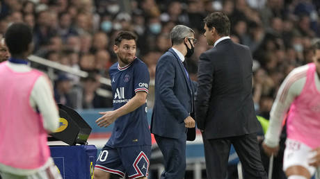 Messi seemed unhappy at being hooked off by Pochettino. © AP