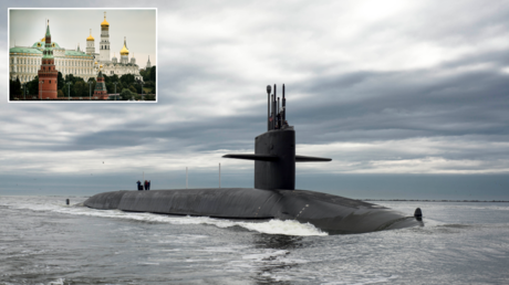 Ohio-class ballistic missile submarine USS Tennessee. © Reuters / James Kimber; (inset) Kremlin. © AFP / Alexander NEMENOV
