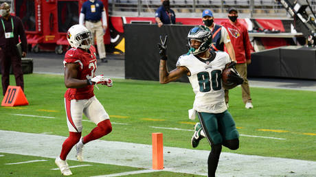 Philadelphia Eagles wide receiver Quez Watkins taunts Arizona Cardinals free safety Chris Banjo. © USA Today Sports