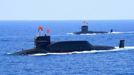 China's nuclear-powered submarines during a display in the South China Sea. © Reuters