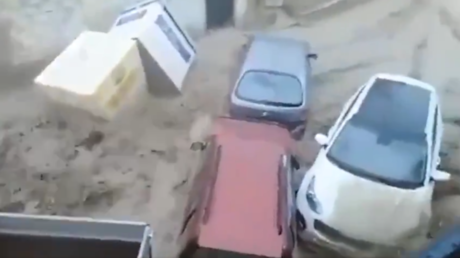 Cars dragged through Spanish streets after heavy rainfall causes flash floods (VIDEOS)