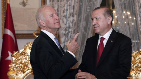 FILE PHOTO: Then-US Vice President Joe Biden talks with Turkish President Recep Tayyip Erdogan, after their meeting in Istanbul on January 23, 2016.