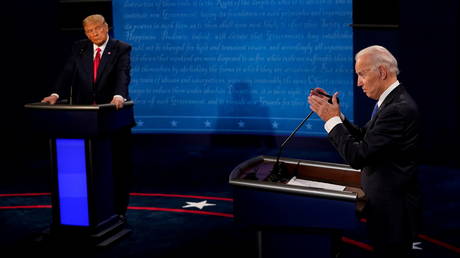 FILE PHOTO: Donald Trump (L) and Joe Biden are shown at their final debate before last November's presidential election.