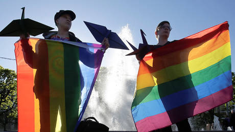 FILE PHOTO. LGBT activists hold a rally on the International Day Against Homophobia, Transphobia and Biphobia in central Saint Petersburg, Russia. © Reuters / Anton Vaganov