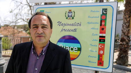 FILE PHOTO. The mayor of Riace town, Domenico Lucano, poses in Riace, Italy on April 22, 2016.